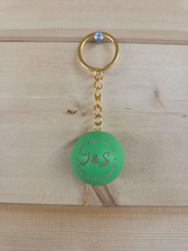 Porte-clés cochonnet personnalisé en couleur vert avec logo