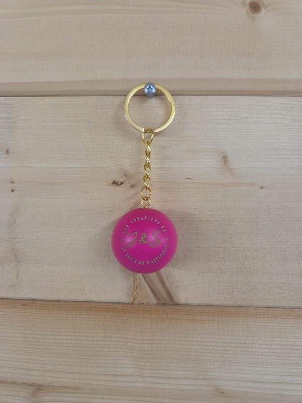 Porte-clés cochonnet personnalisé de couleur rose fluo gravé
